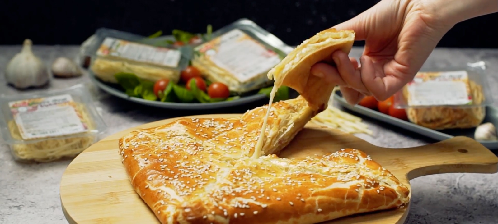 Khachapuri with garlic cheese threads